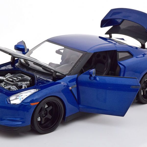 Nissan GT-R (R35) "Fast & Furious" Brian ( Inkl. Figuur ) met Led Verlichting Blauw Metallic 1-18 Jada Toys