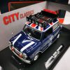 Morris Mini Cooper 1961-67 Blauw met Britse vlag op het dak 1-18 Motormax