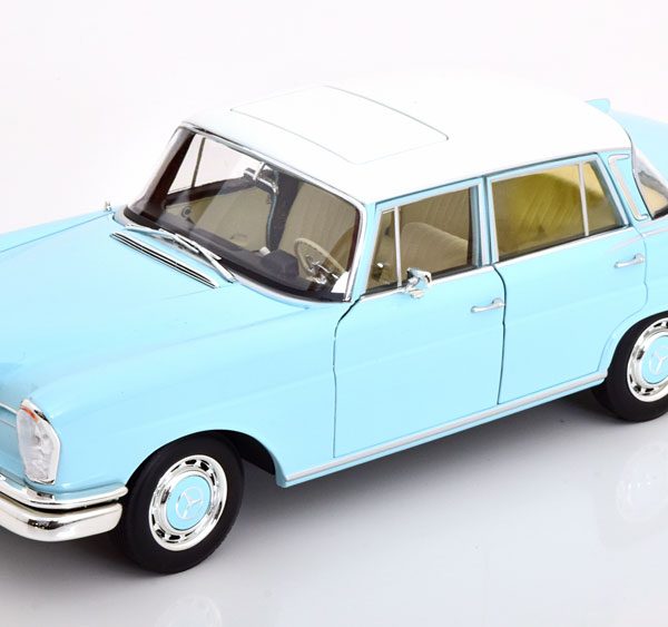 Mercedes-Benz 220S (W111) 1965 "Heckflosse" Lichtblauw / Wit 1-18 Norev