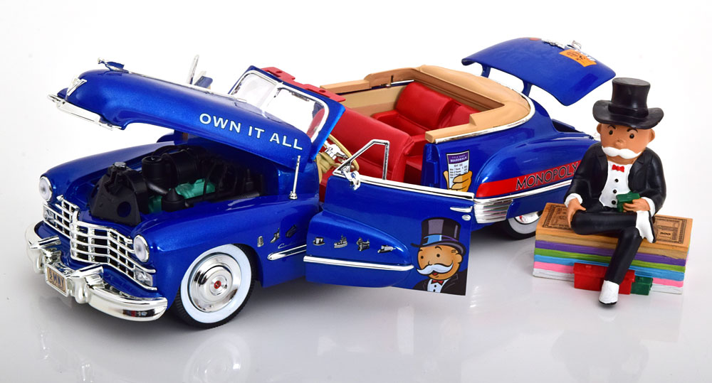 Cadillac Serie 62 Cabriolet 1947 "Monopoly met Figuur" 1-18 Ertl/Autoworld
